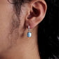 “Vintage-style sterling silver Larimar earrings worn by female model”