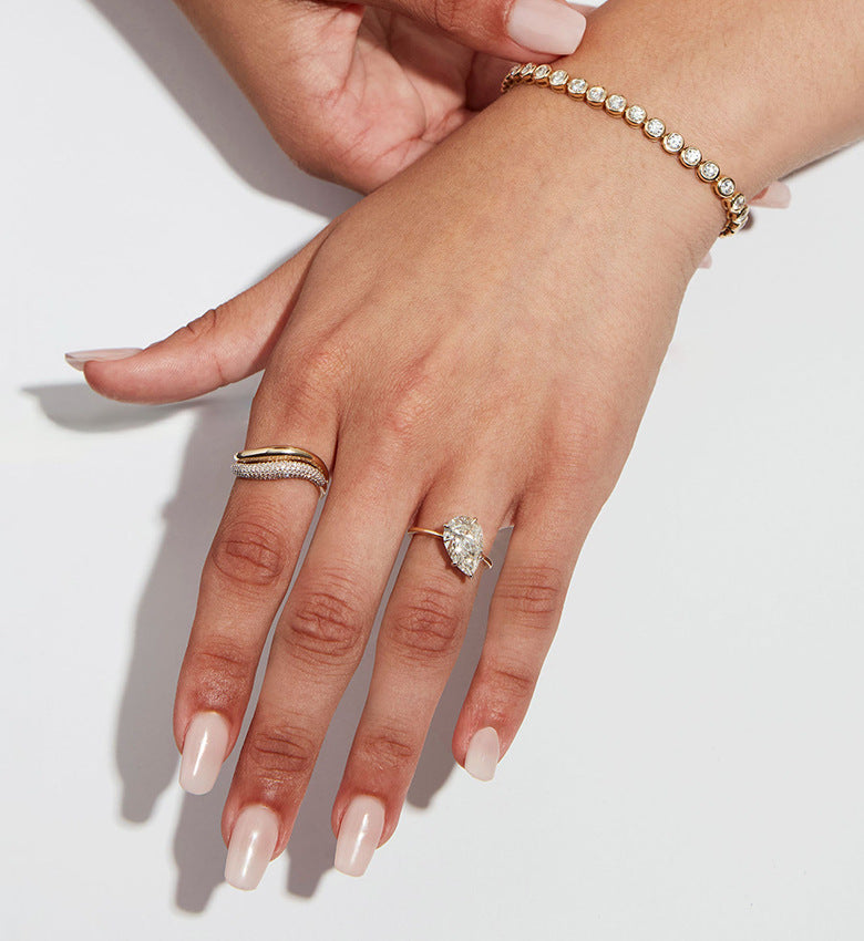 “Woman wearing elegant minimalist geometric silver ring with light luxury style”