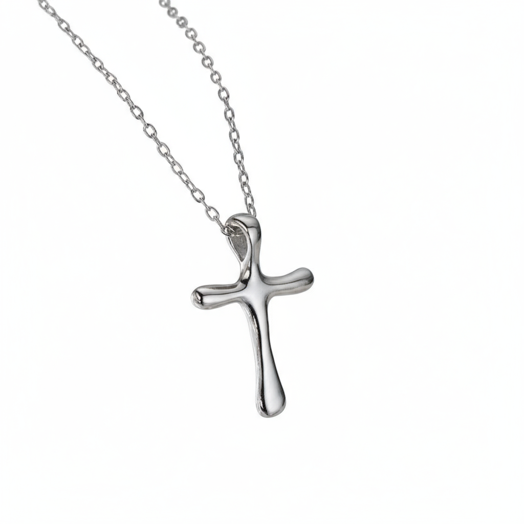 “Flat lay of S925 sterling silver molten cross pendant necklace with irregular texture”