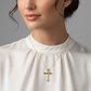 “Woman wearing minimalist sterling silver molten cross pendant necklace”