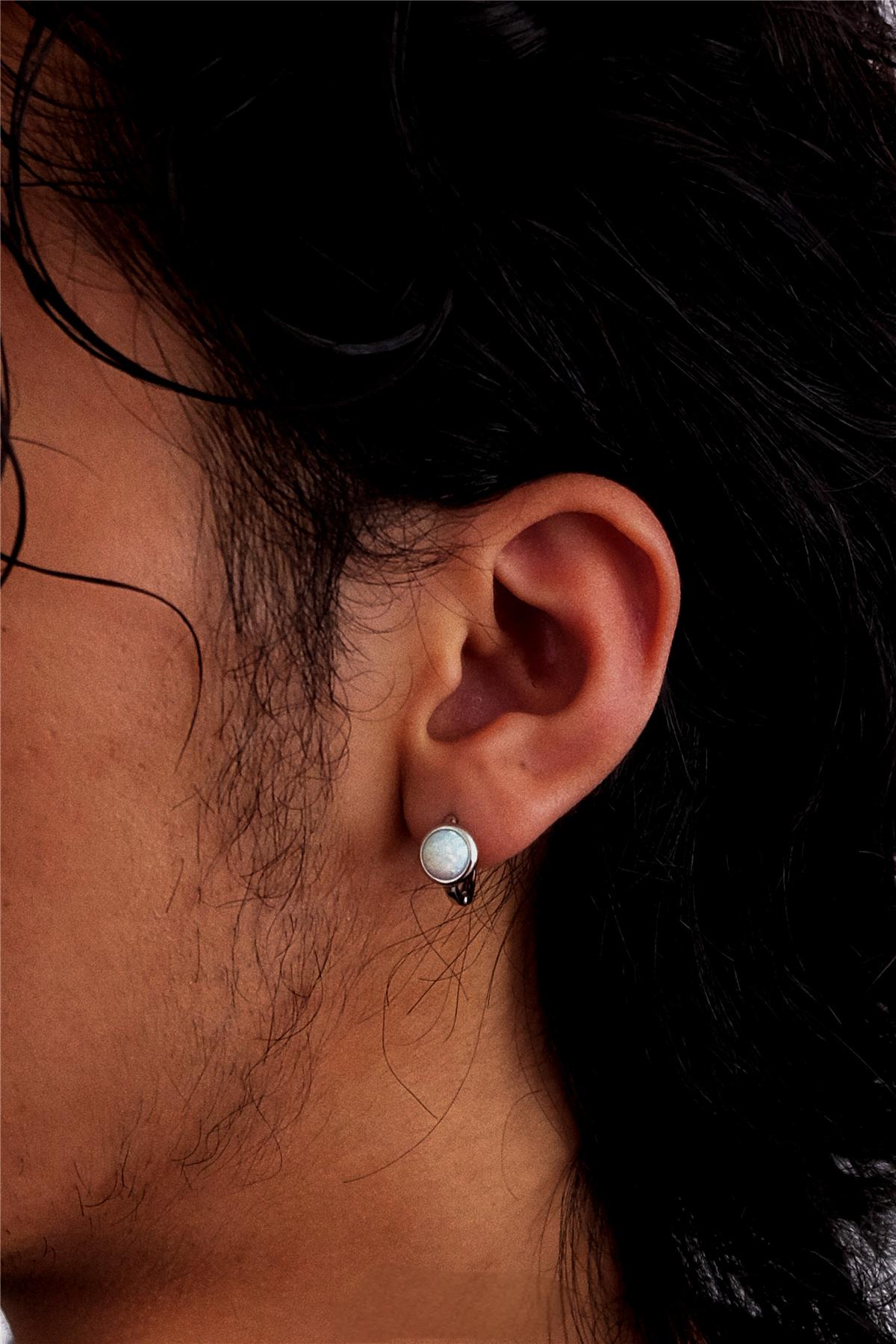 model wearing unisex opal hoop earrings minimalist style