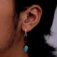 “Unisex Tibetan ethnic earrings styled on model – cultural vintage look”