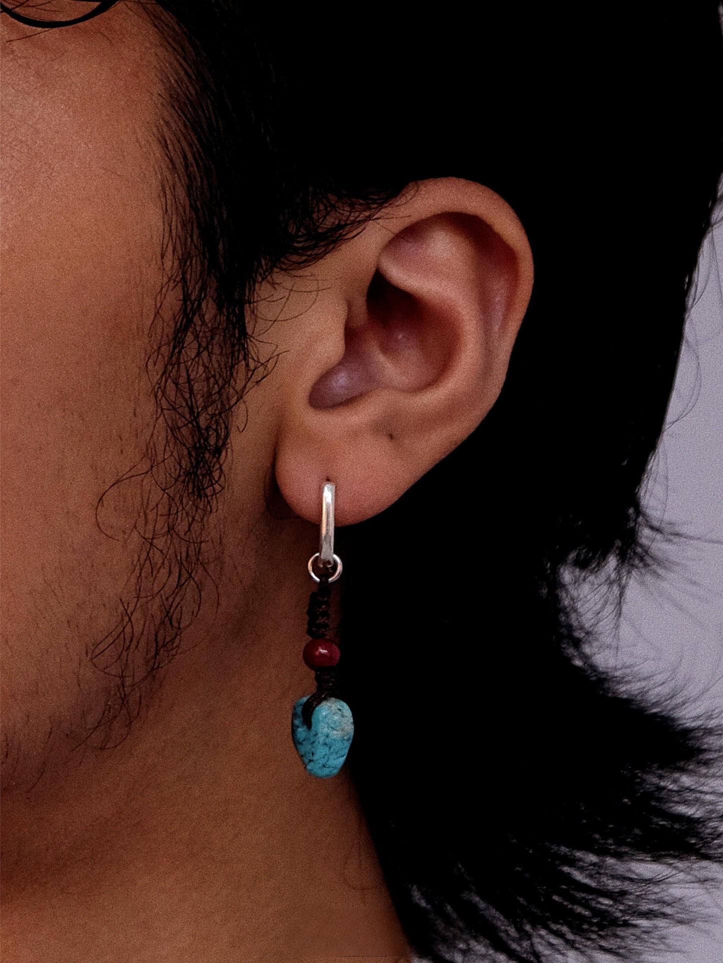“Unisex Tibetan ethnic earrings styled on model – cultural vintage look”
