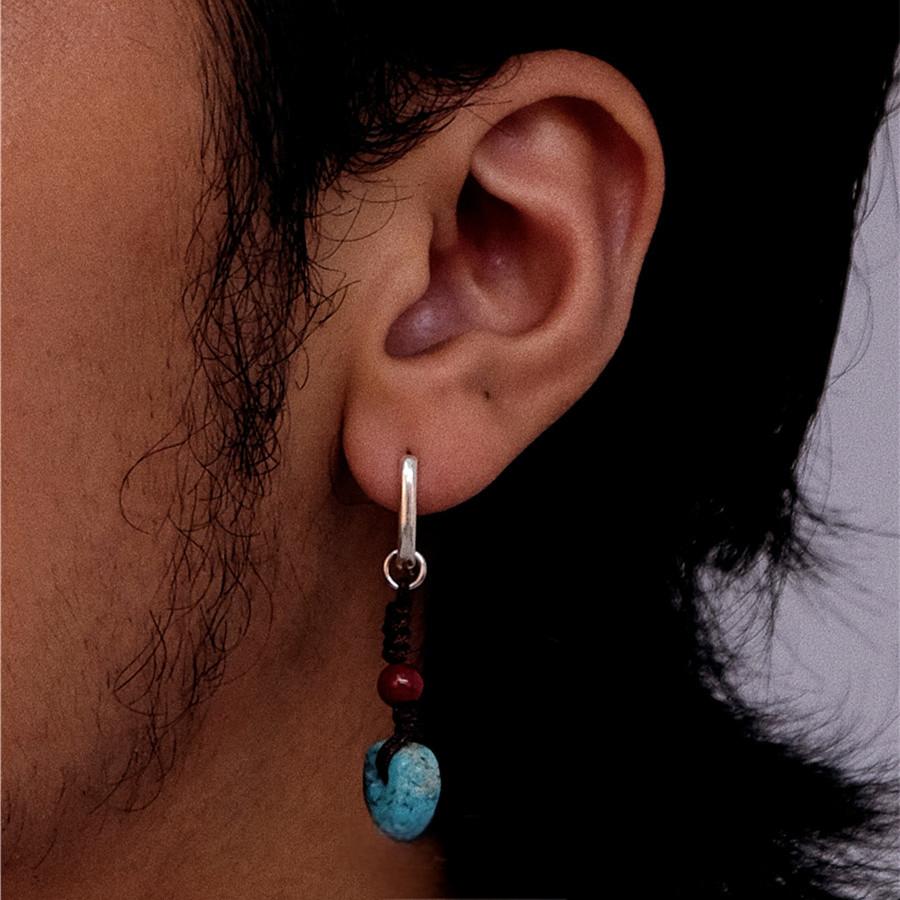 “Unisex Tibetan ethnic earrings styled on model – cultural vintage look”