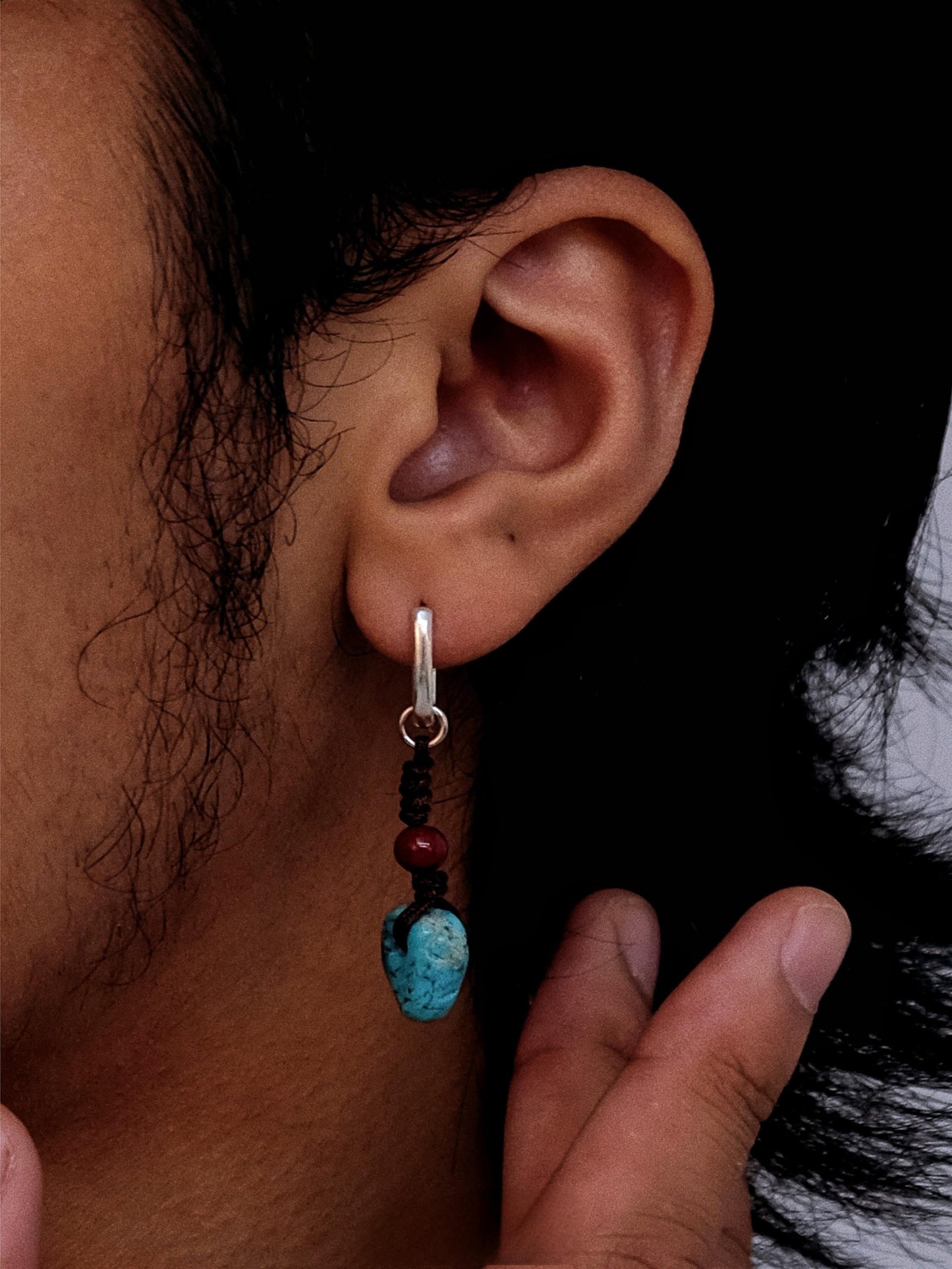 “Handcrafted raw turquoise cinnabar earrings worn with boho outfit”