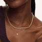 “Female model wearing sliding heart necklace with sparkling zircon pendant”