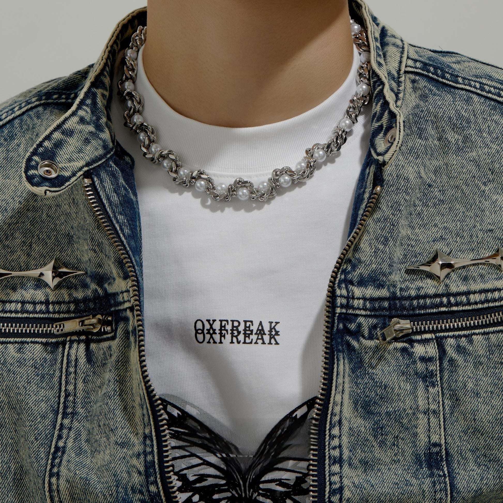 “streetwear men’s silver snake choker styled with cold aesthetic outfit”