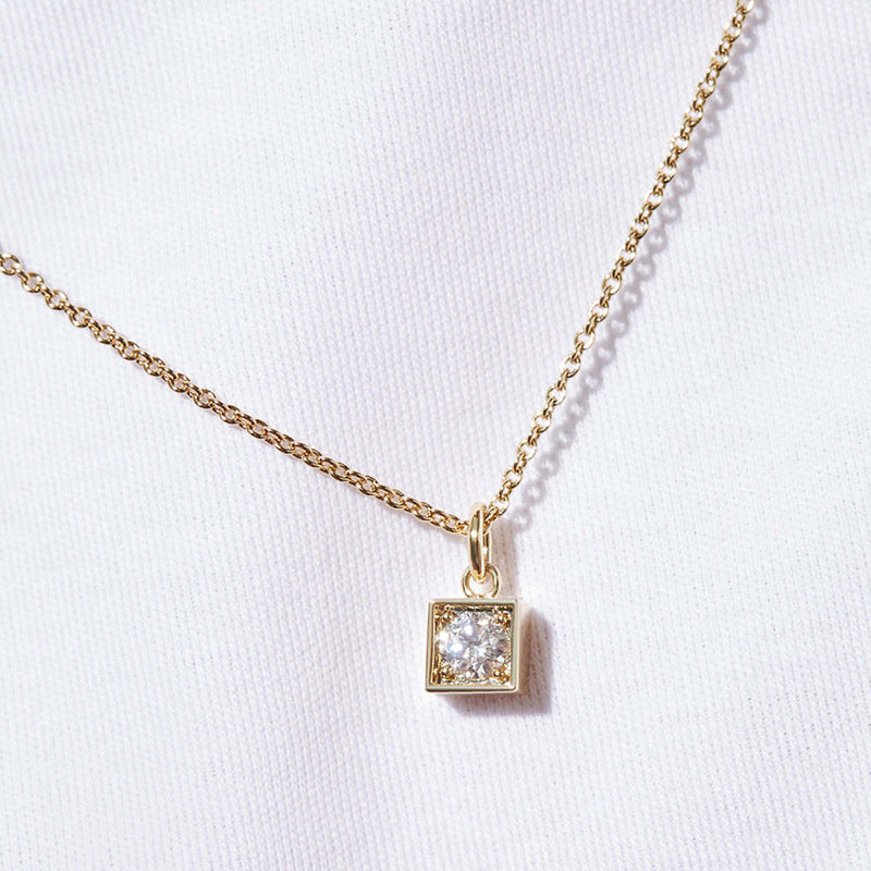 Close-up of Square Pendant with Round Cubic Zirconia Stone