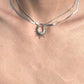 “men’s minimalist silver sun god necklace styled with cold aesthetic outfit”