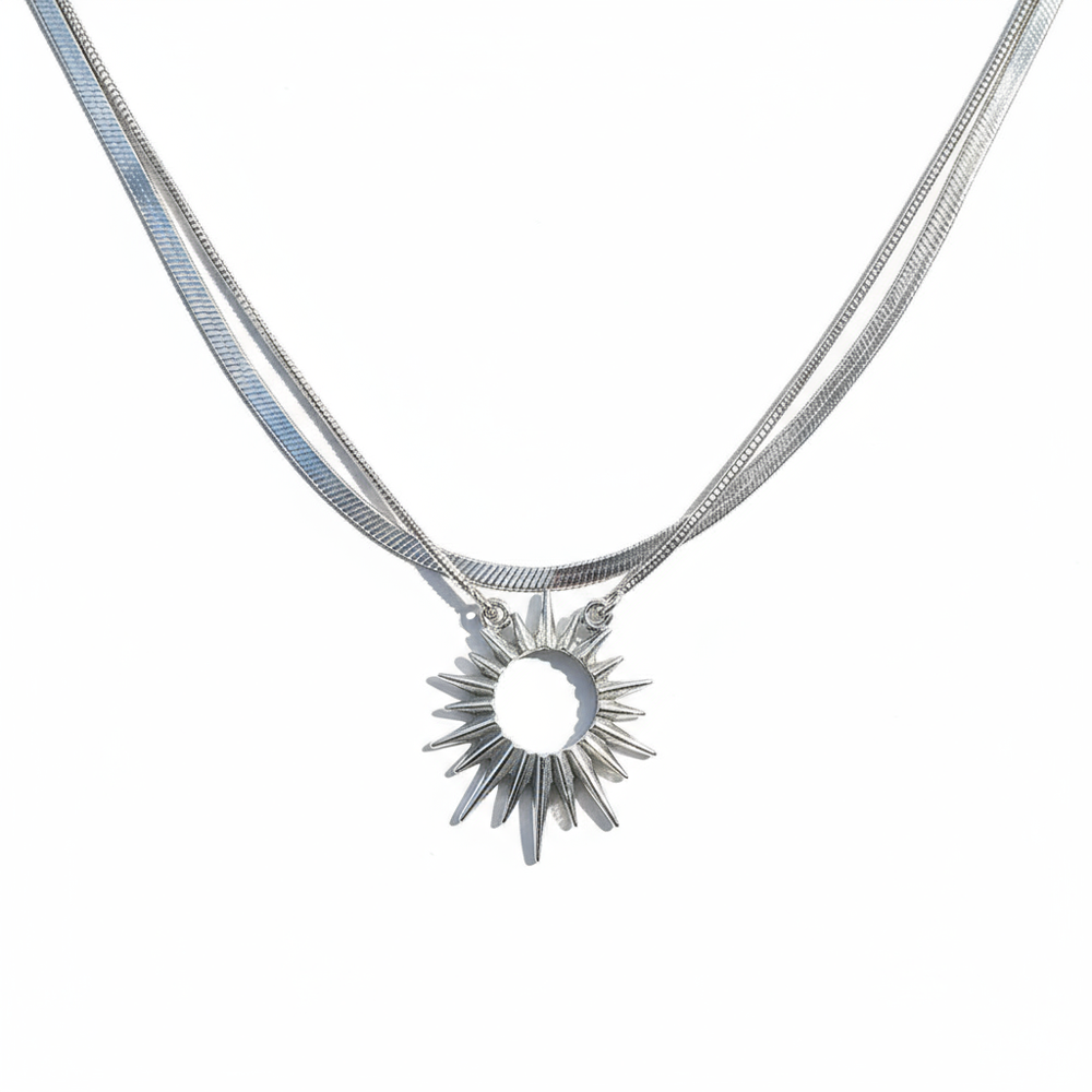 “men’s minimalist silver sun god necklace styled with cold aesthetic outfit”