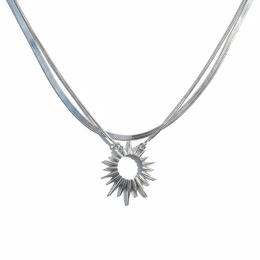 “men’s minimalist silver sun god necklace styled with cold aesthetic outfit”