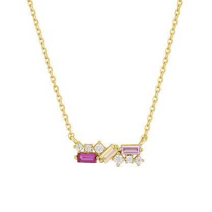 Gold necklace with gemstone pendants on a white background