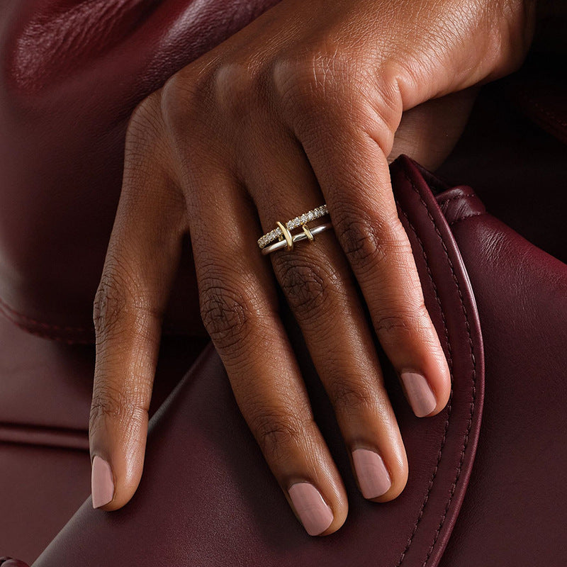 “Woman wearing elegant two-tone zircon ring with light luxury style”