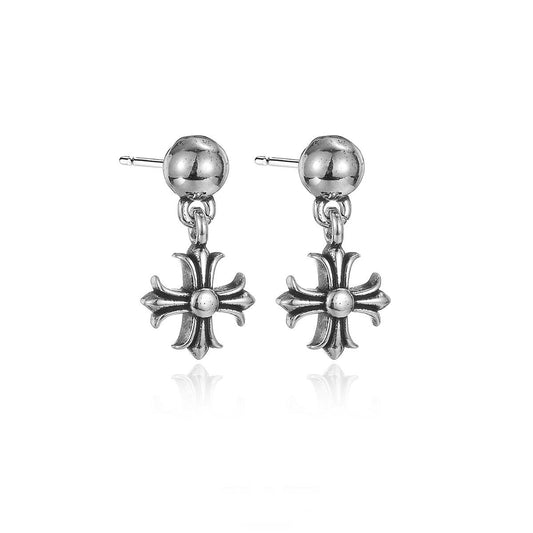 S925 distressed sterling silver cross earrings flat lay