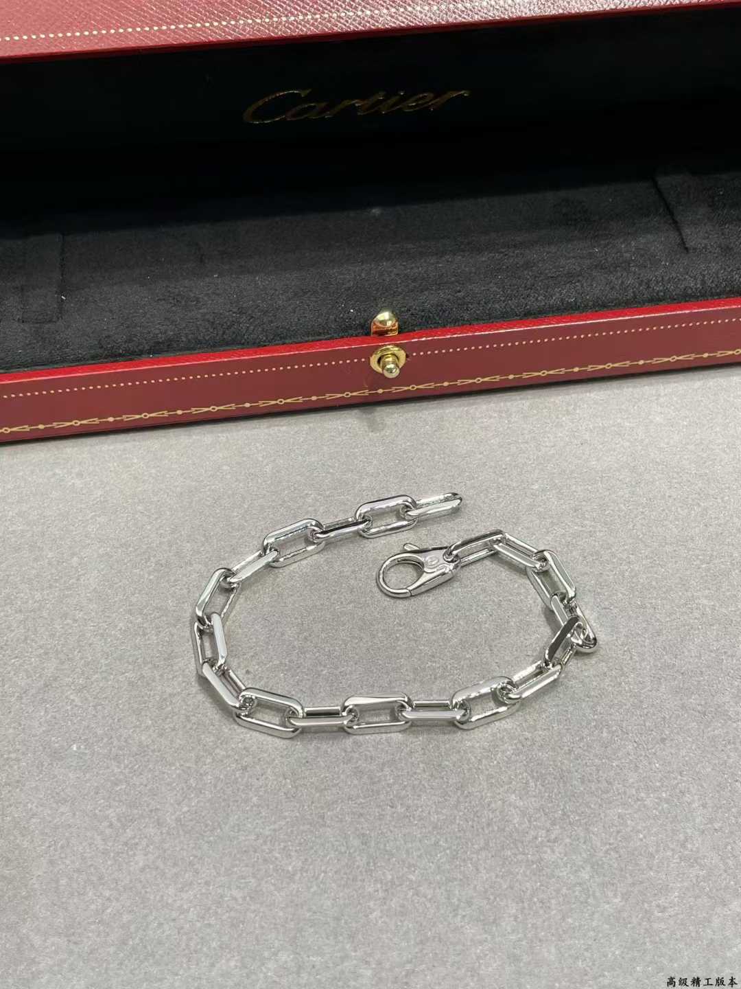 “Close-up of Santos screw link design Cartier bracelet”