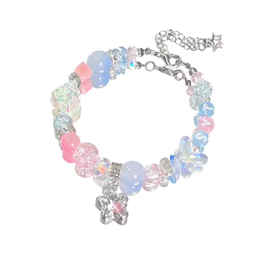 Colorful beaded bracelet with butterfly charms on a white background