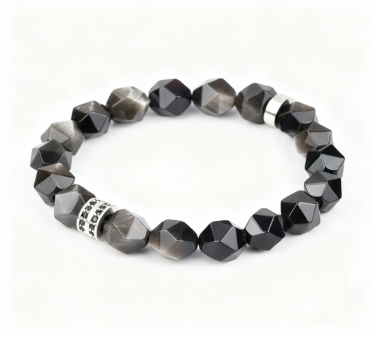 Black and gray beaded bracelet on a white background