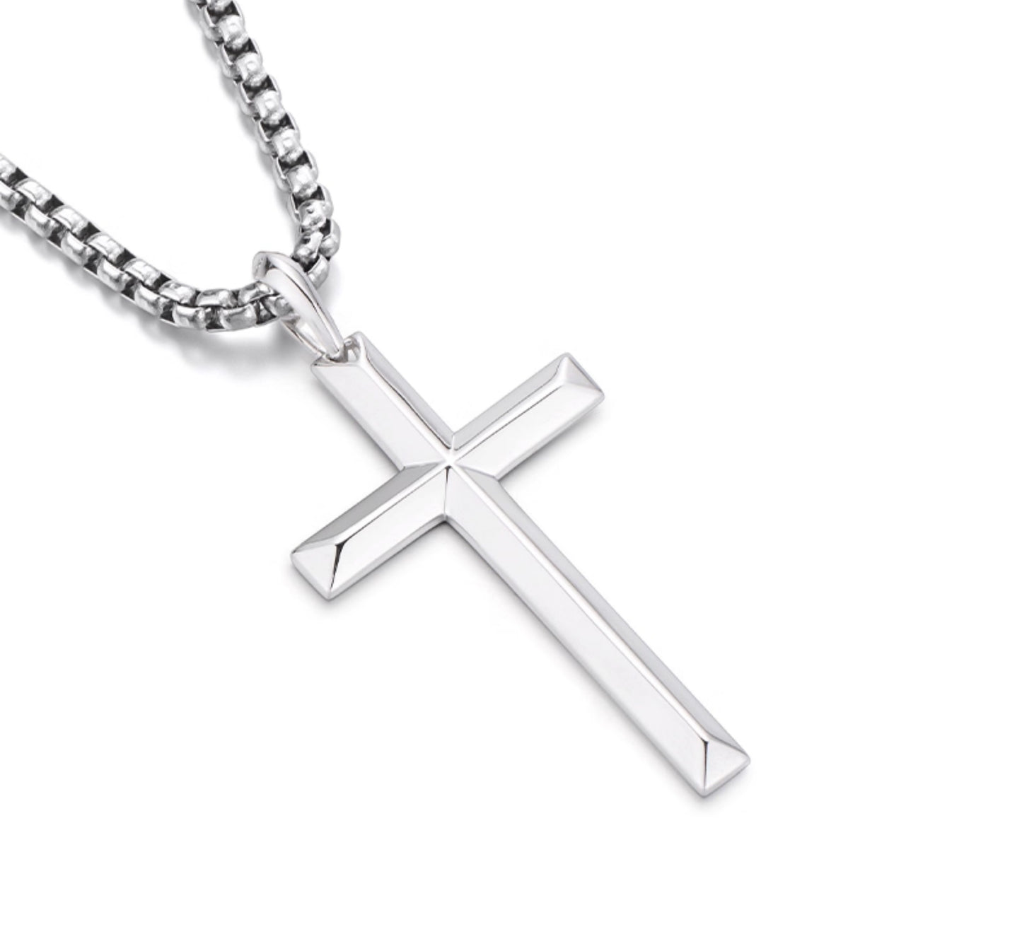 “Close-up of sterling silver cross pendant craftsmanship”