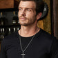 “Male model wearing sterling silver cross necklace”
