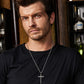 “Male model wearing sterling silver cross necklace”