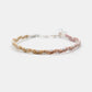 Bracelet with braided design on a white background