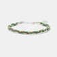 Braided bracelet with green and gold tones on a white background