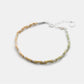 Bracelet with braided design on a white background