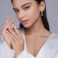 Model wearing the necklace alone on bare skin.