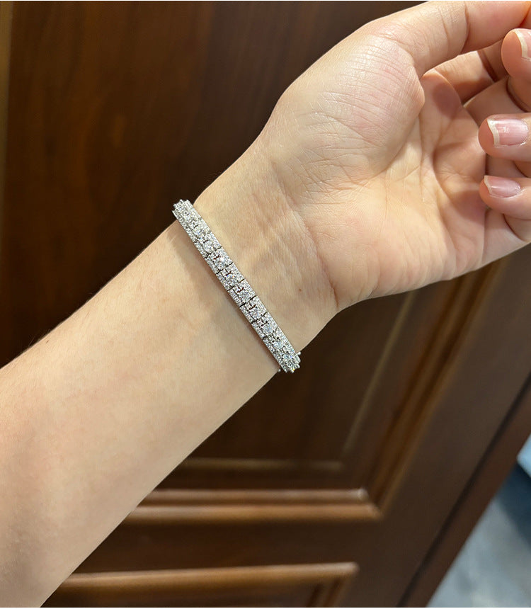 Female Model: Model wearing the bracelet on wrist, showing how the 3mm cluster catches light.