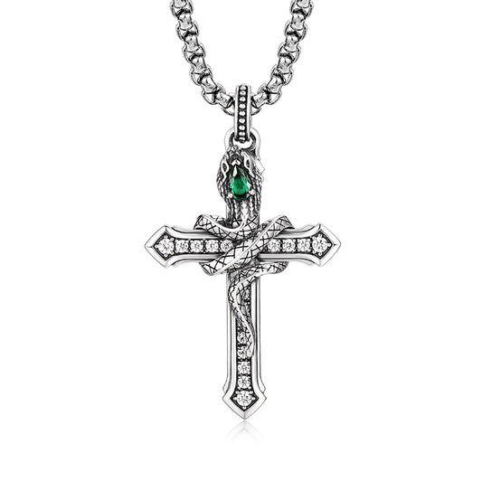 “Men’s sterling silver serpent cross necklace flat lay on white background”
