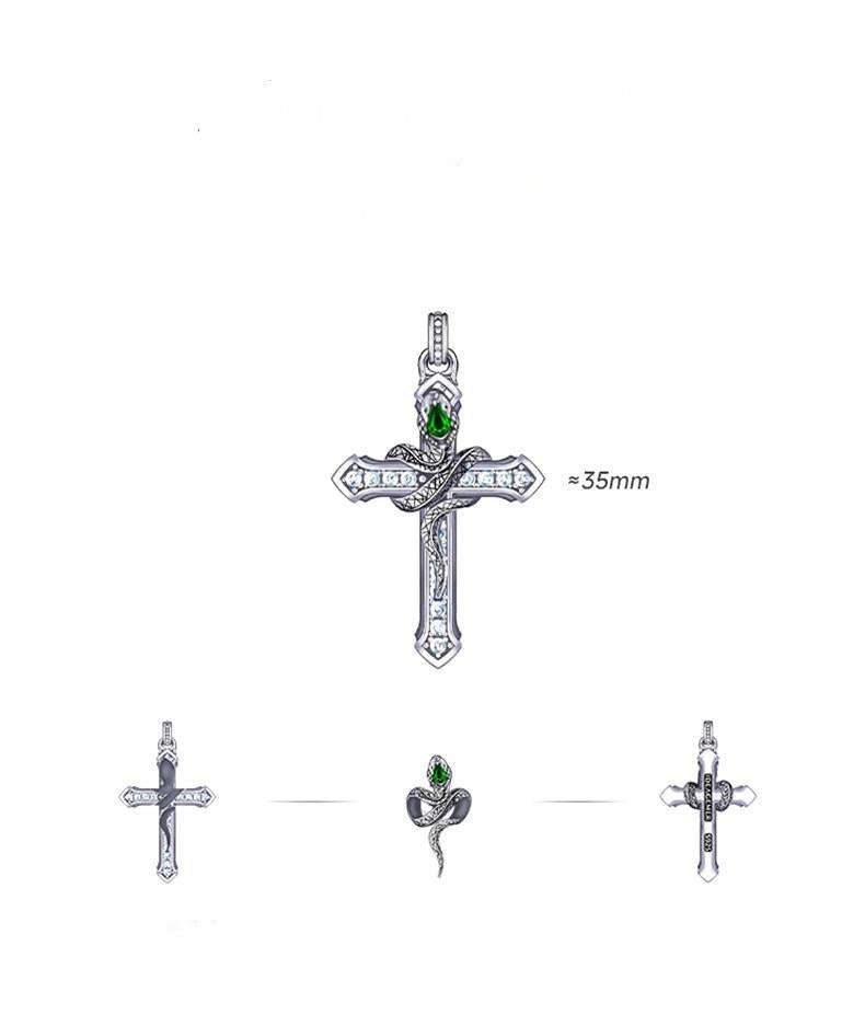 “Close-up of sterling silver serpent cross pendant with detailed craftsmanship”