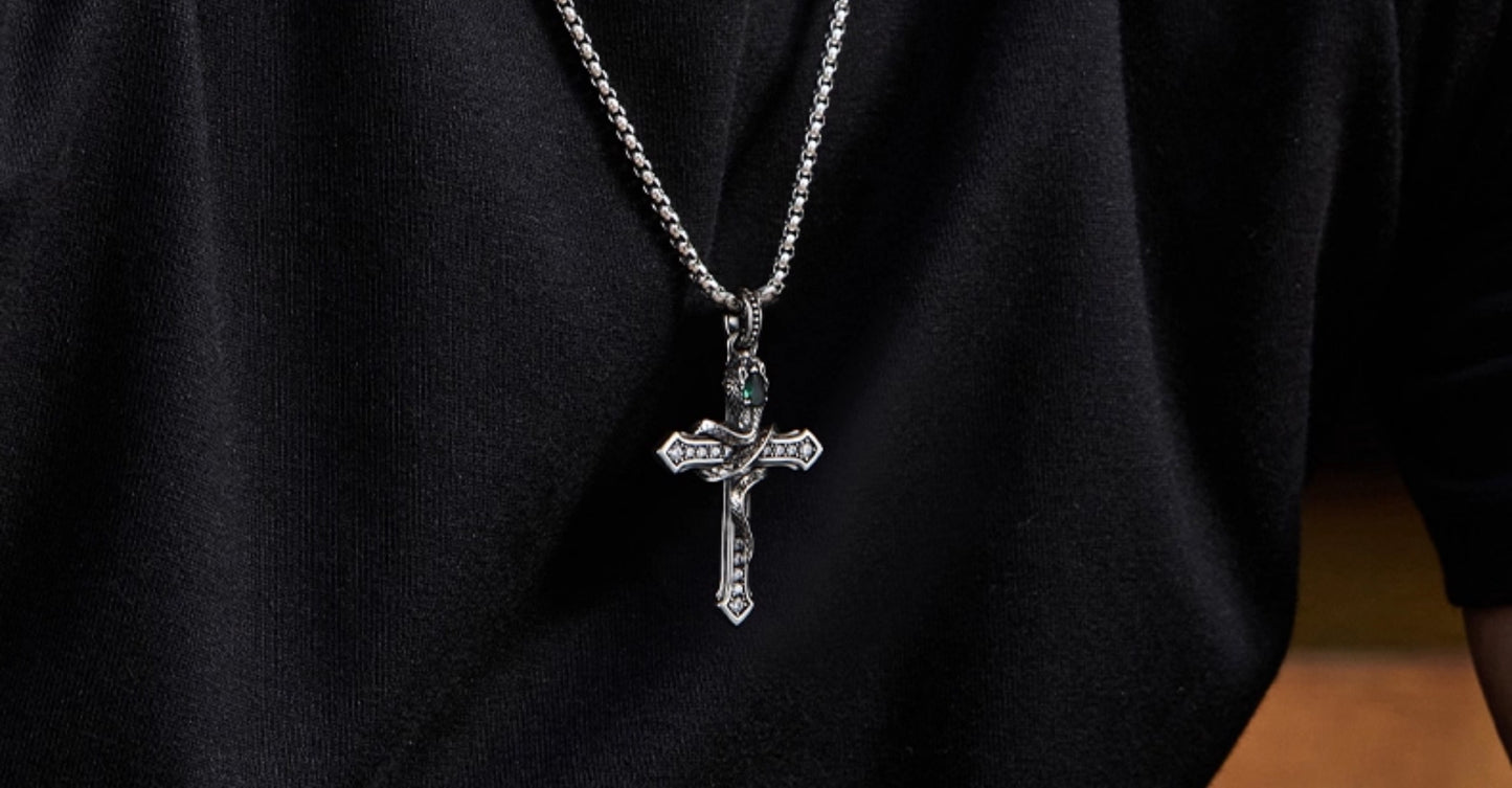 “Unique snake cross pendant styled with men’s casual outfit”