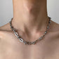 Male model wearing thorn knot Cuban silver chain