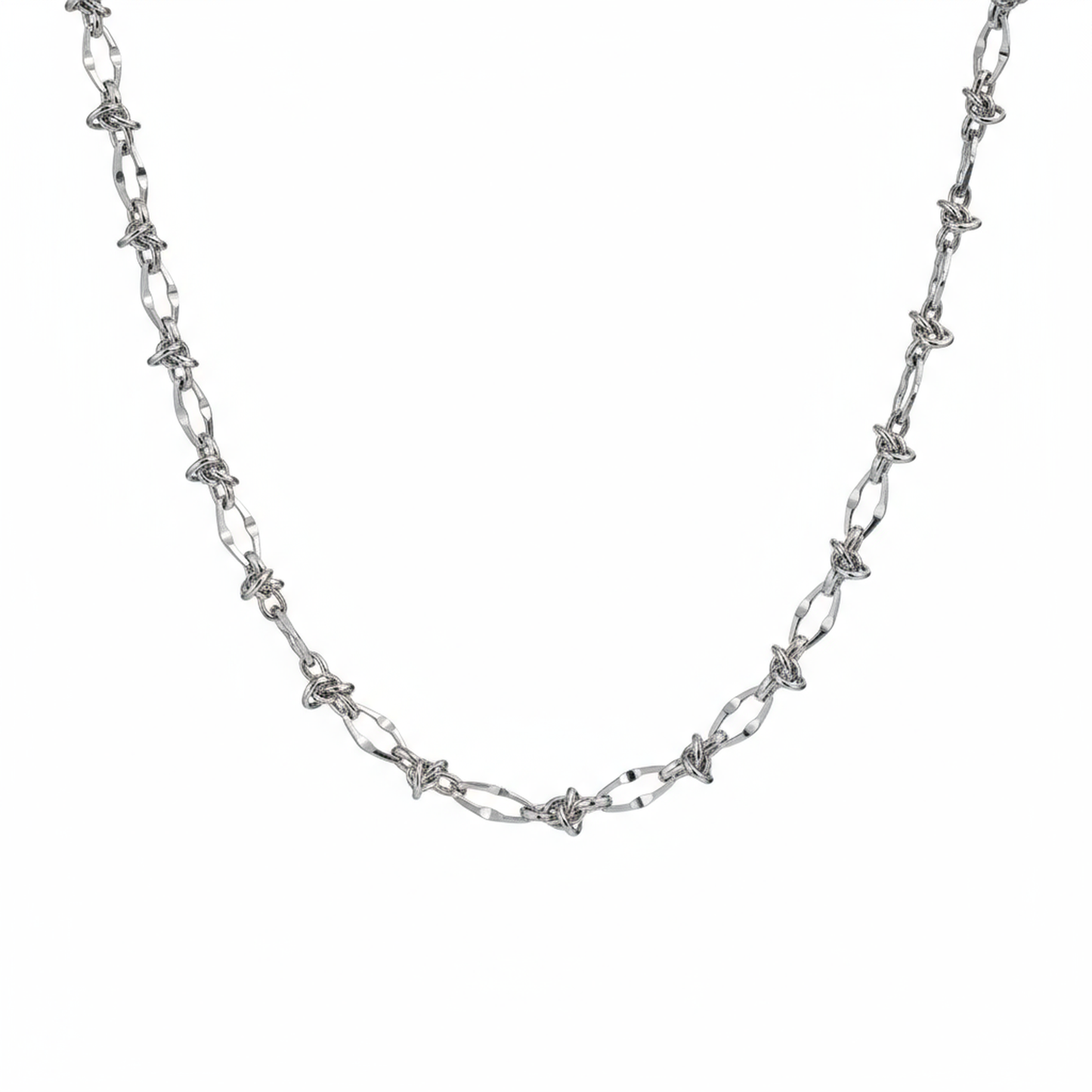 Male model wearing thorn knot Cuban silver chain