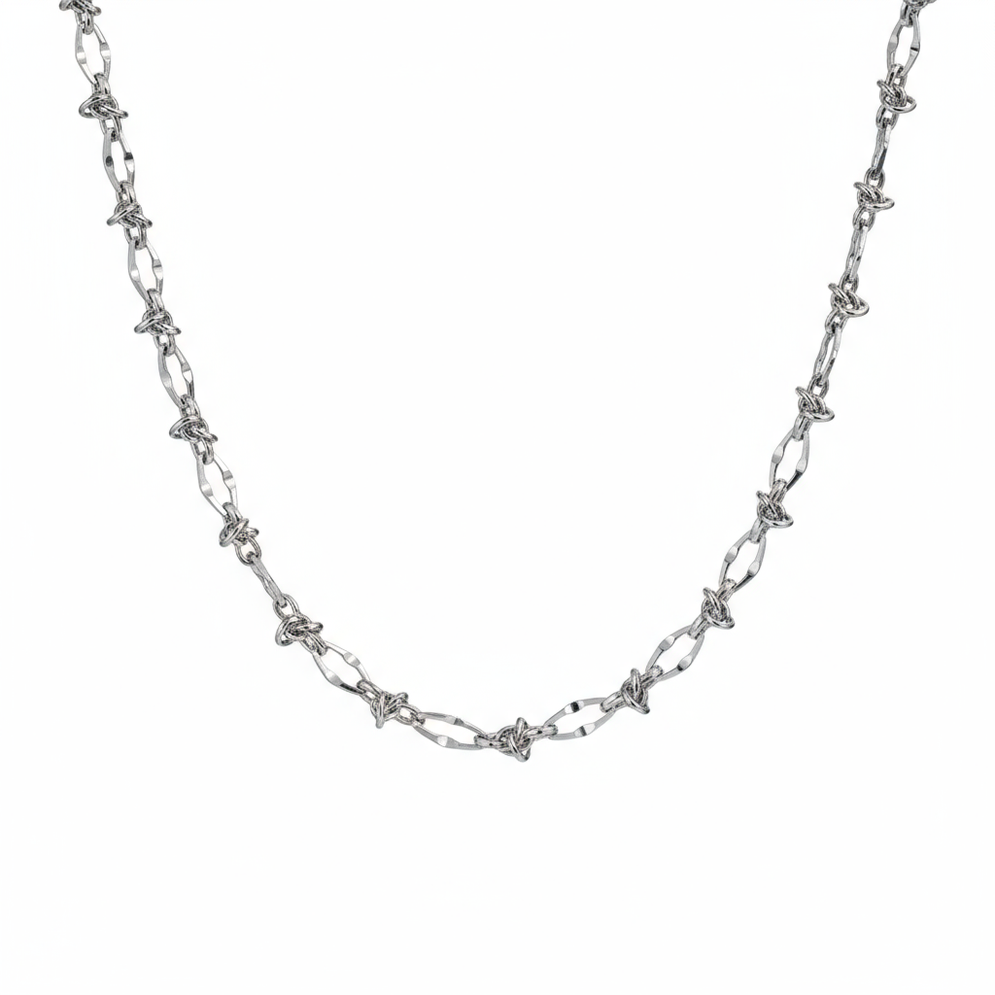 Male model wearing thorn knot Cuban silver chain