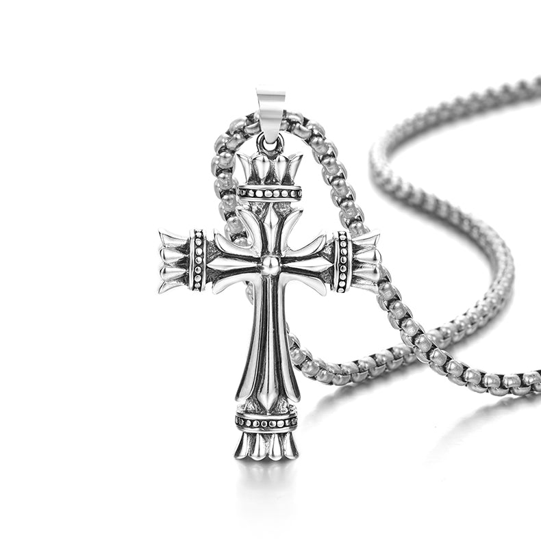 “Rugged men’s silver cross pendant product photo”