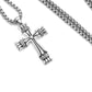 “Textured cross pendant showing craftsmanship and silver detailing”