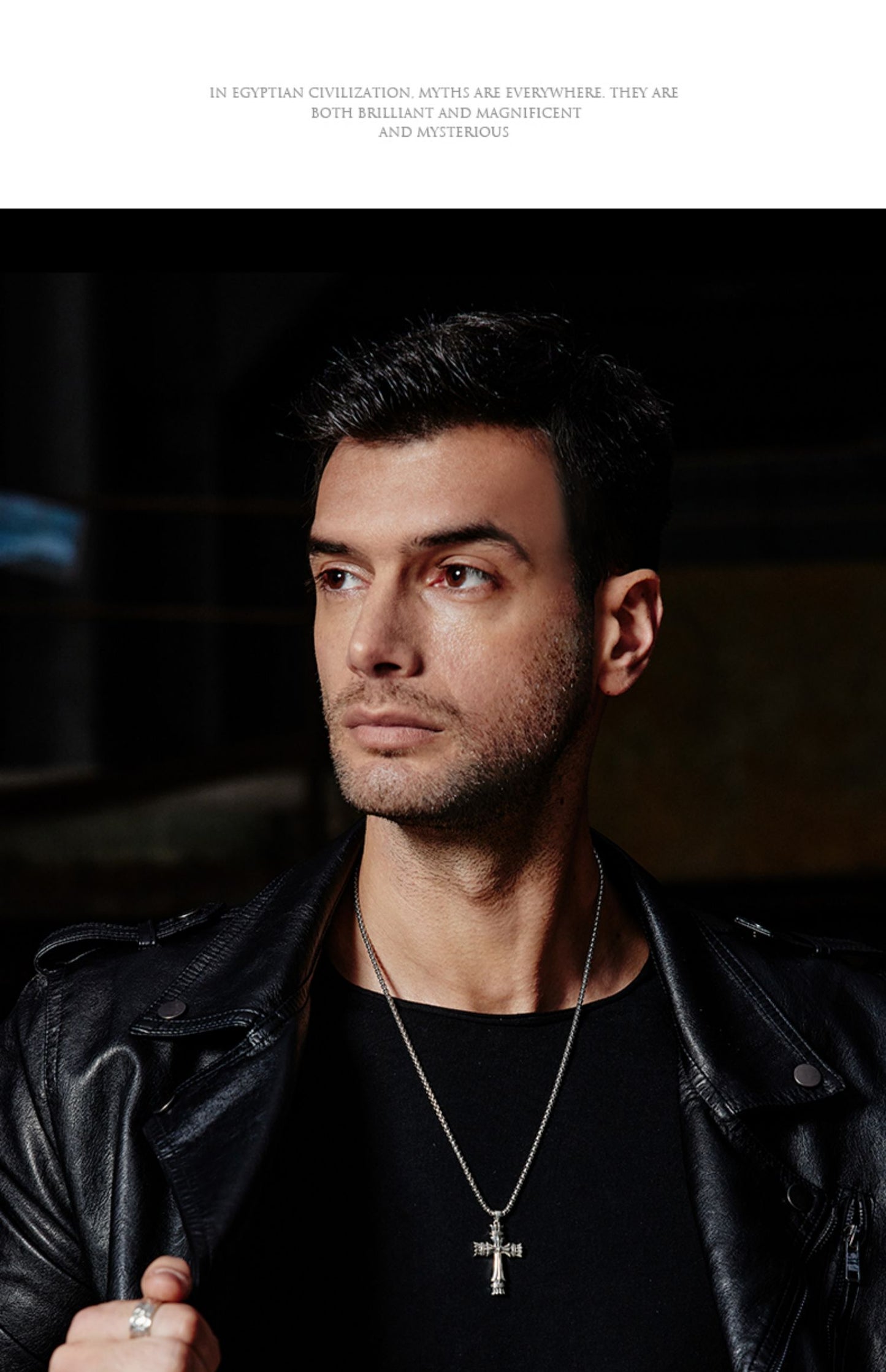 “Male model wearing vintage sterling silver cross necklace, rugged street style”