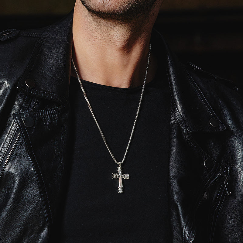 “Cross pendant styled with casual outfit for men’s fashion look”