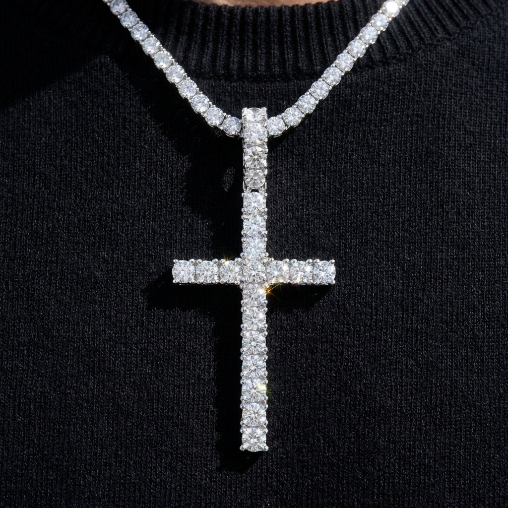Diamond-studded cross pendant on a black sweater