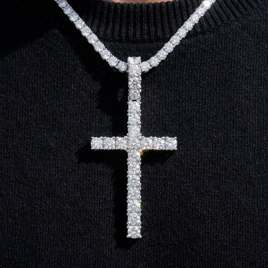 Diamond-studded cross pendant on a black sweater