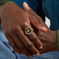 “Male model wearing minimalist sterling silver ring on hand”