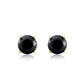 Pair of black gemstone stud earrings with gold prongs on a white background