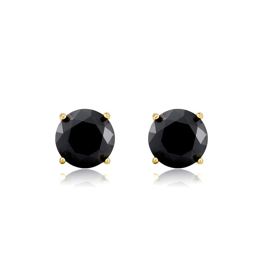 Pair of black gemstone stud earrings with gold prongs on a white background