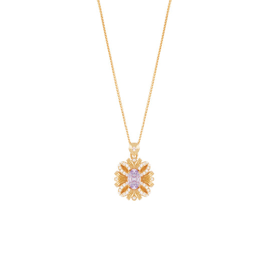 Gold necklace with a floral pendant on a white background