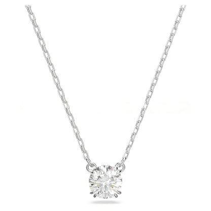 Silver necklace with a round diamond pendant on a white background