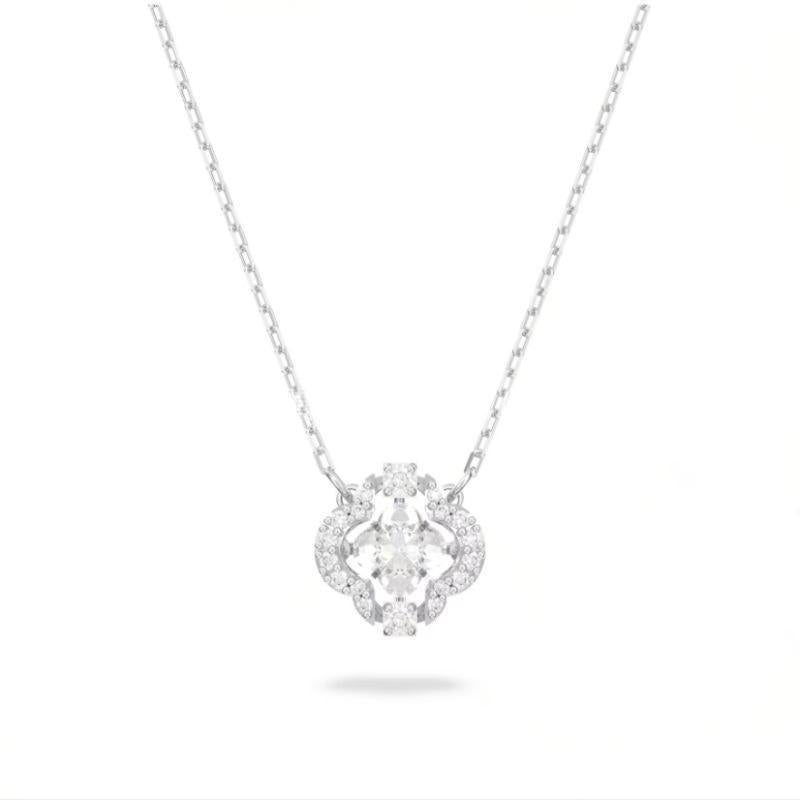 Swarovski Crystal Blue Dancing Clover NecklaceDiamond necklace with a heart-shaped pendant on a white background