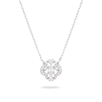 Swarovski Crystal Blue Dancing Clover NecklaceDiamond necklace with a heart-shaped pendant on a white background
