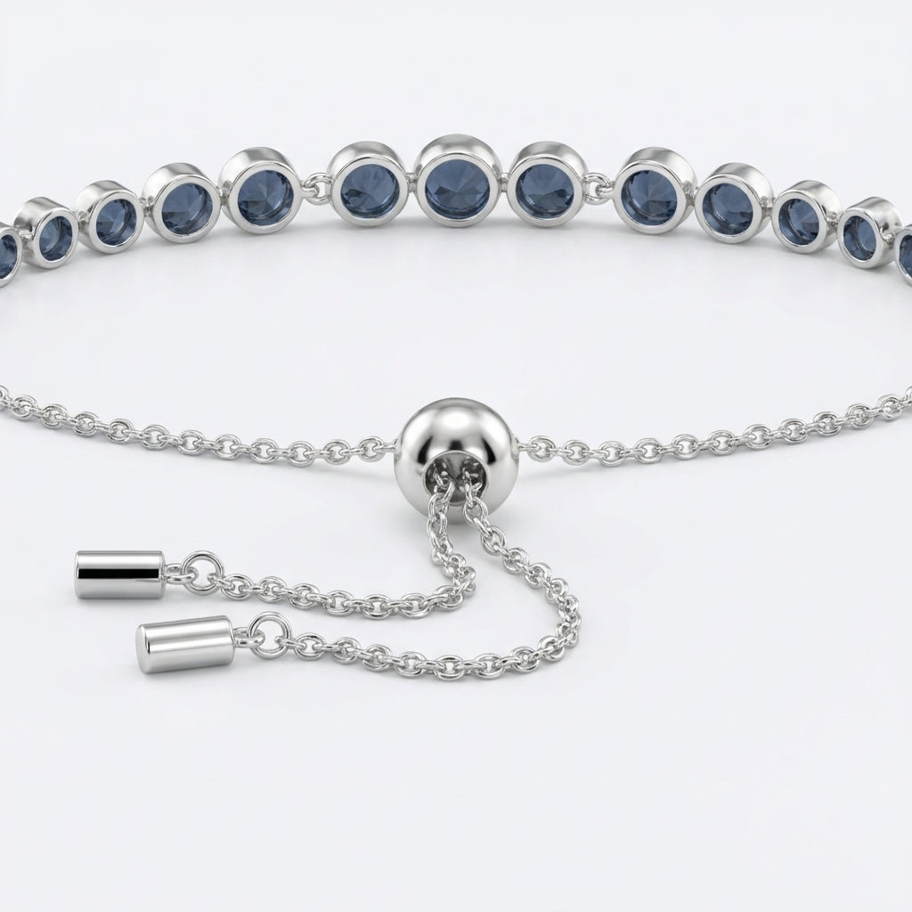 Silver bracelet with blue stones on a white background