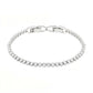 Silver bracelet with clear stones on a white background